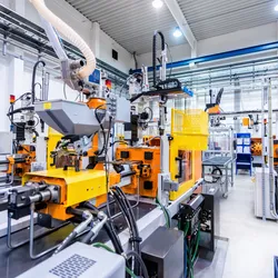 Plastic polymer production line representing materials commonly evaluated through GPC analysis of polymers to determine molecular weight and branching characteristics.