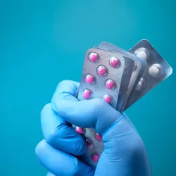 surgical glove holding blister packs