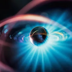 Visualization of atomic structure with glowing electron orbits, symbolizing isotopic differentiation and mass-to-charge separation principles used in isotope ratio mass spectrometry for nuclear chemistry applications.