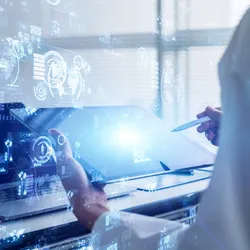 Scientist using a digital tablet and stylus in a high-tech lab environment with data visualizations and interface graphics overlayed, representing innovations in analytical science.