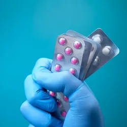 surgical glove holding blister packs