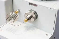Close-up of a gas chromatograph inlet.