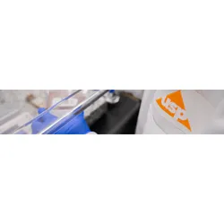 scientist wearing USP-branded lab coat performing analysis