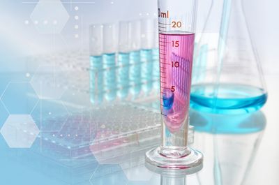 Sample prep equipment showing conical flask and test tubes in a laboratory