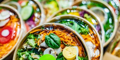 Takeout containers illustrating the importance of PFAS detection in food safety.