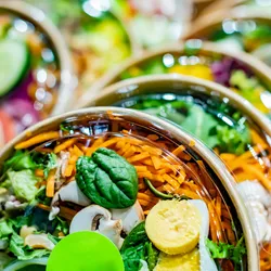 Takeout containers illustrating the importance of PFAS detection in food safety.