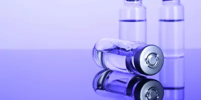 three scientific vials