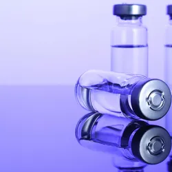 three scientific vials