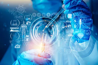 Scientist conducting assay development automation with pipette
