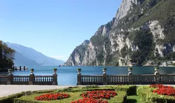 A scenic lakefront view in Riva del Garda, Italy
