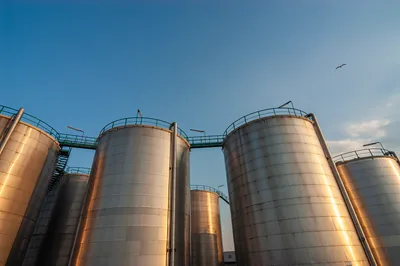 Metal storage silos used for gas containment.