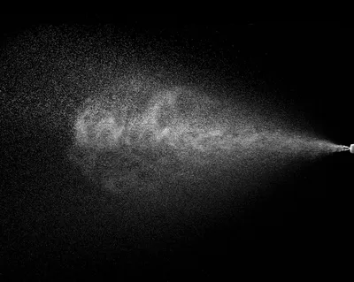 High-speed spray of solvent droplets for ambient ionization