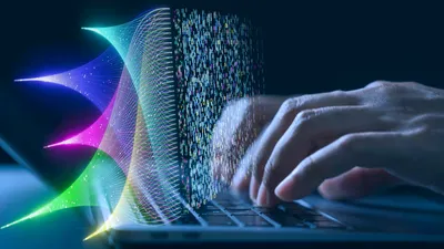 A vibrant digital graphic overlapping a laptop display, illustrating next-gen lab technology.