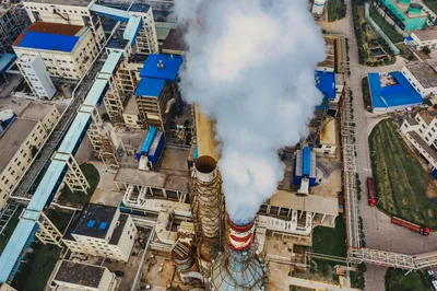 Factory smoke indicating need for PFAS air monitoring regulations