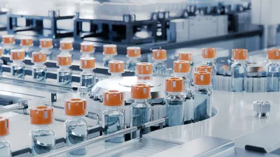 Biopharmaceutical process highlighting ultrafiltration-diafiltration with vials.