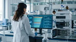 Method development scientist reviewing an AI-ranked column and condition shortlist during automated HPLC method scouting
