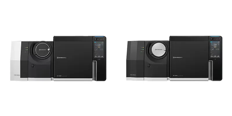 Two Shimadzu GCMS-TQ RX Series triple quadrupole gas chromatography mass spectrometry instruments shown side by side, comprising the TQ8040 RX and TQ8050 RX models.