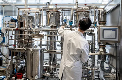 Engineer monitoring advanced chromatography system